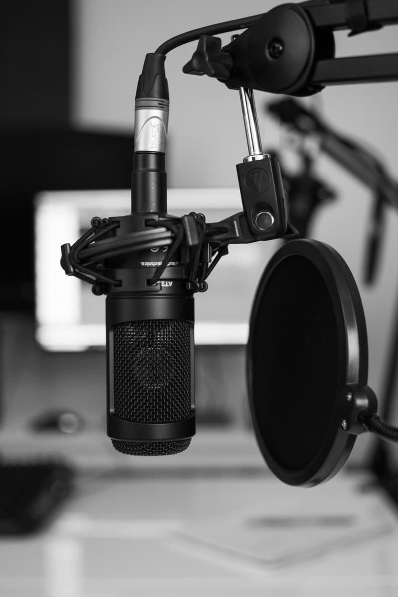 black and silver microphone on black and white photography