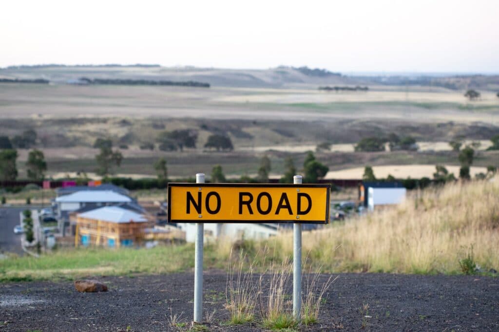 white and blue stop sign