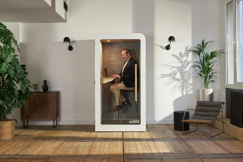 A man sitting in a chair in a room