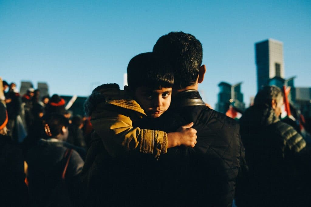 A couple of people that are hugging each other