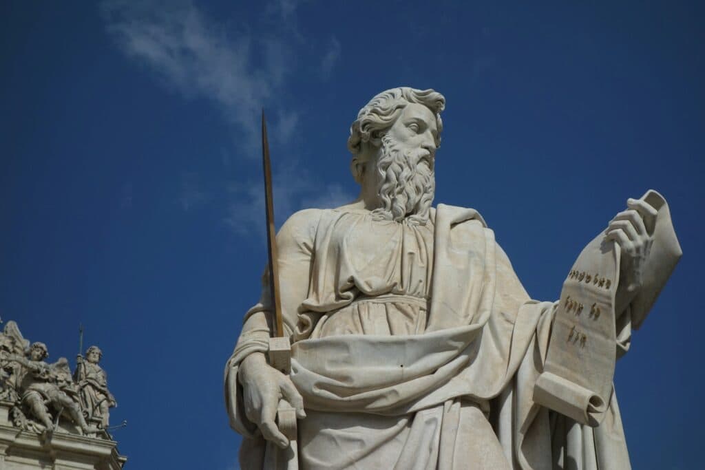 Marble statue of a bearded man holding scroll