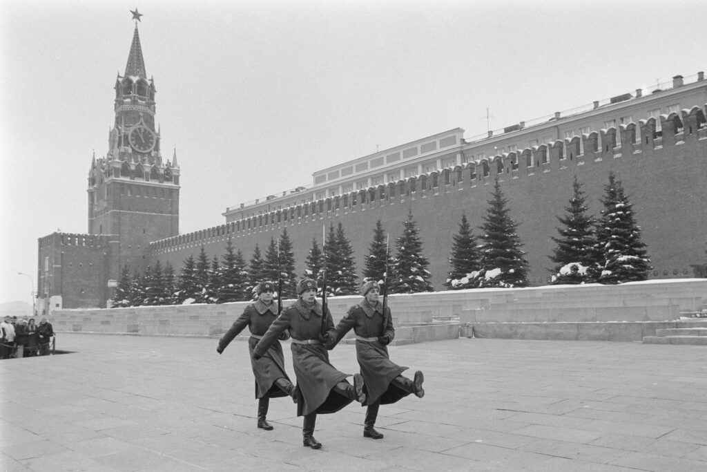 grayscale photo of people walking on street