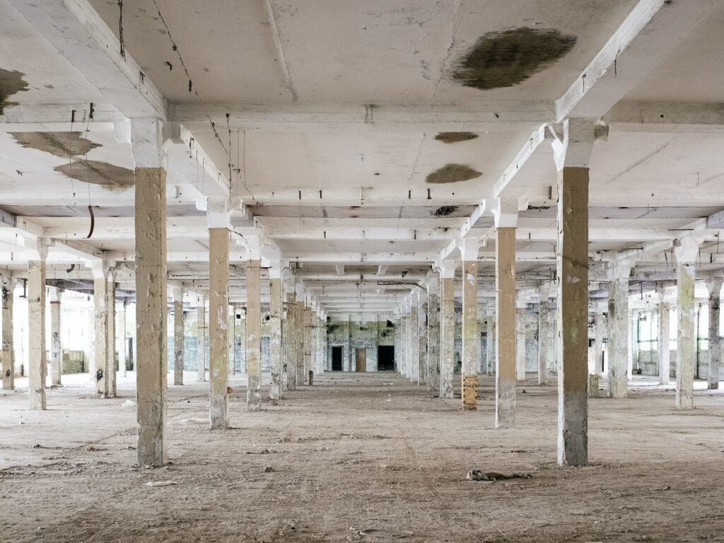 a large room with pillars