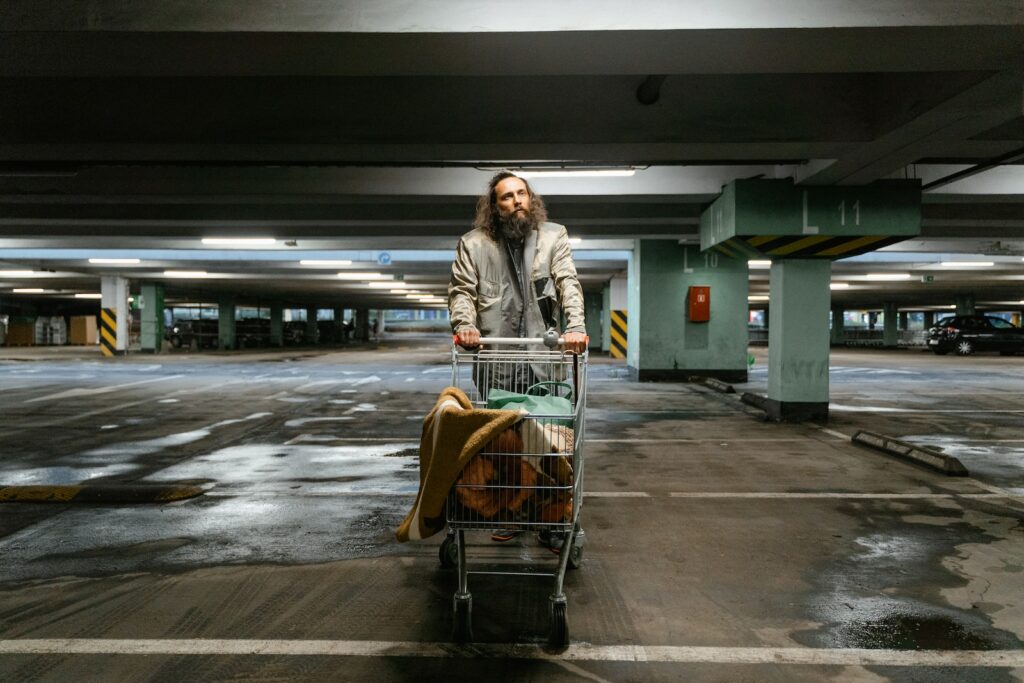 Bearded Man Pushing a Grocery Cart