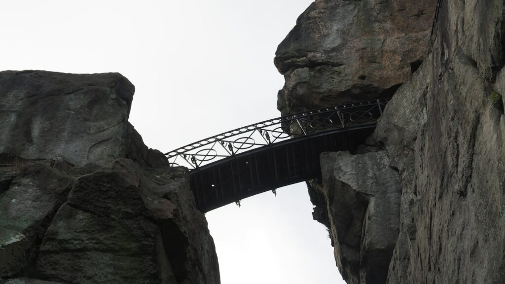 a bridge built into the side of a mountain