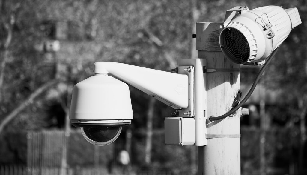 a security camera attached to a pole