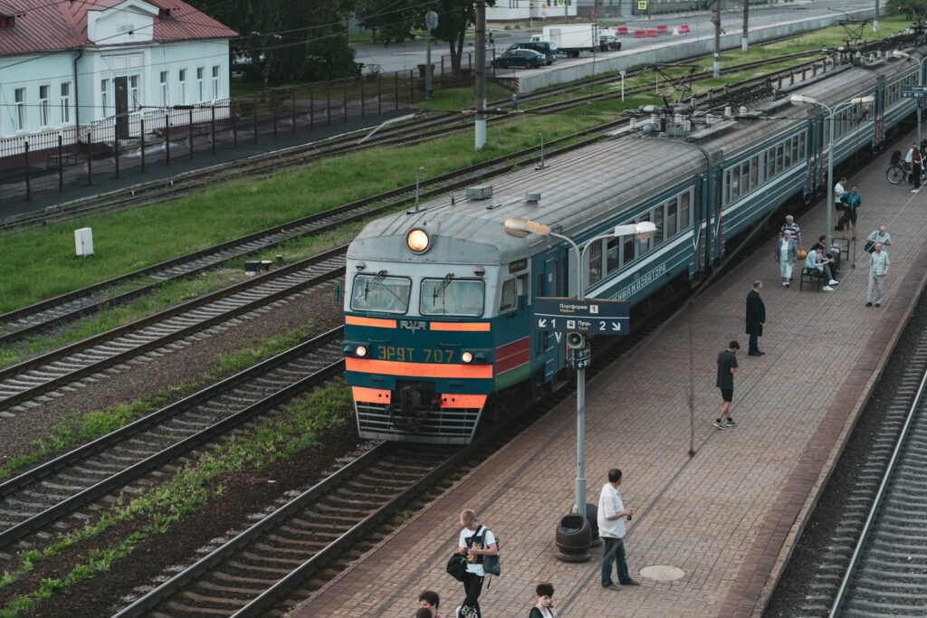 people walking on train station during daytime