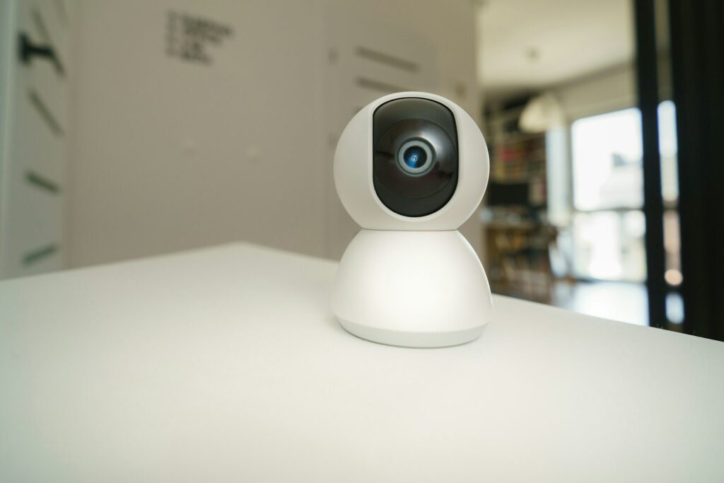 A small camera sitting on top of a white table