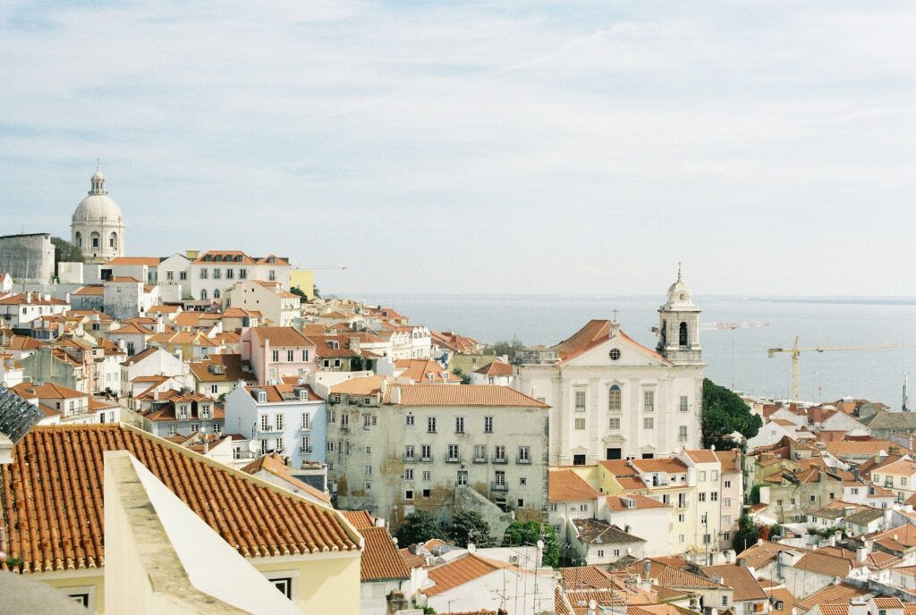 A view of a city from the top of a hill